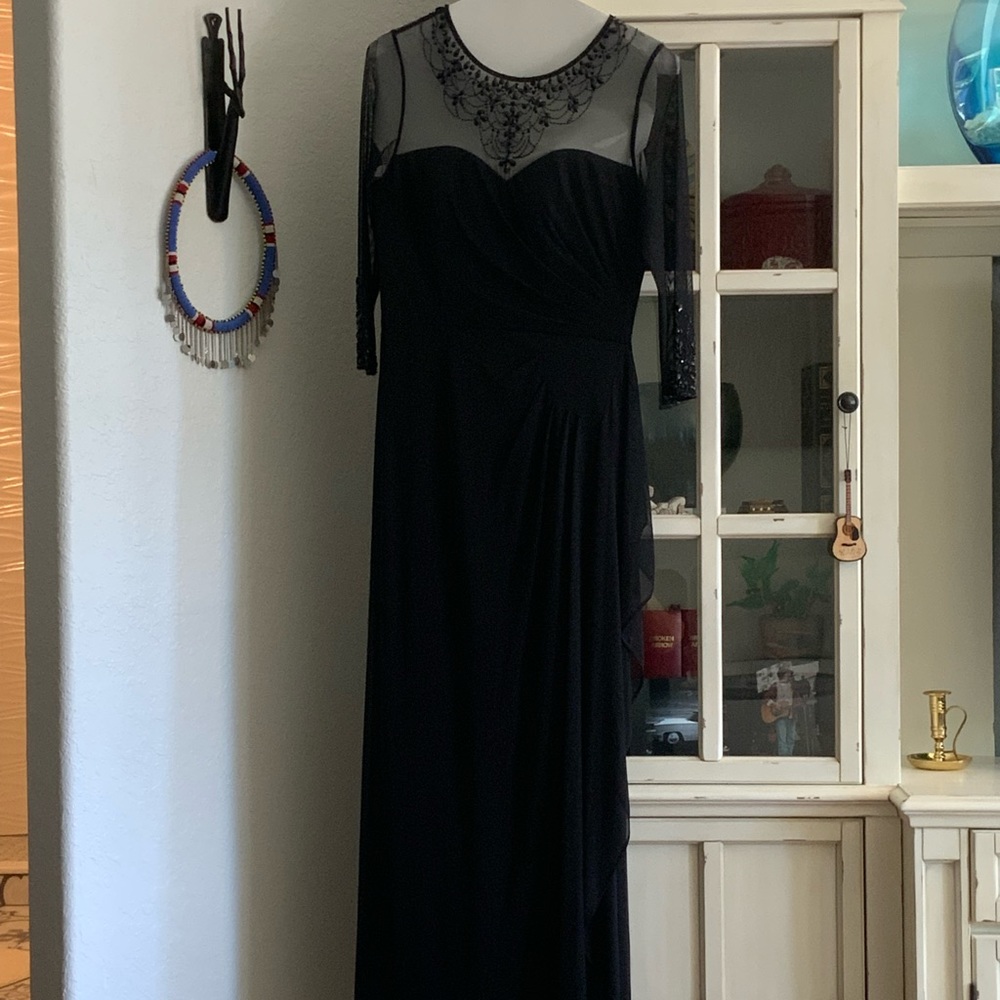 In a wedding? Need a formal dress? Beautiful size 10 beaded gown.